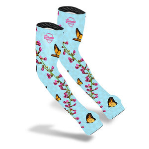 Protection sleeves with light blue background and Monarch Butterflies and green vine with pink flowers